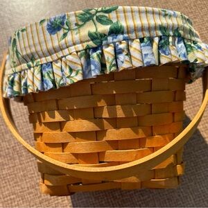 Longaberger basket with floral liner and protective plastic